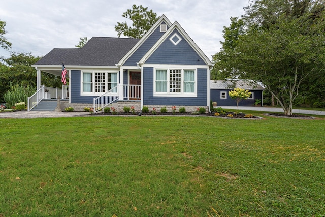 craftsman-style house with a front lawn and a porch