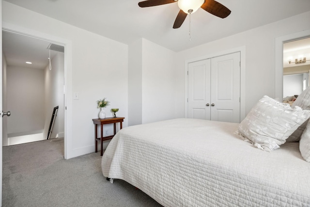 bedroom with carpet flooring, a closet, and ceiling fan