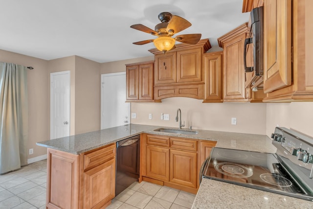 kitchen featuring sink, light tile patterned flooring, ceiling fan, kitchen peninsula, and black appliances