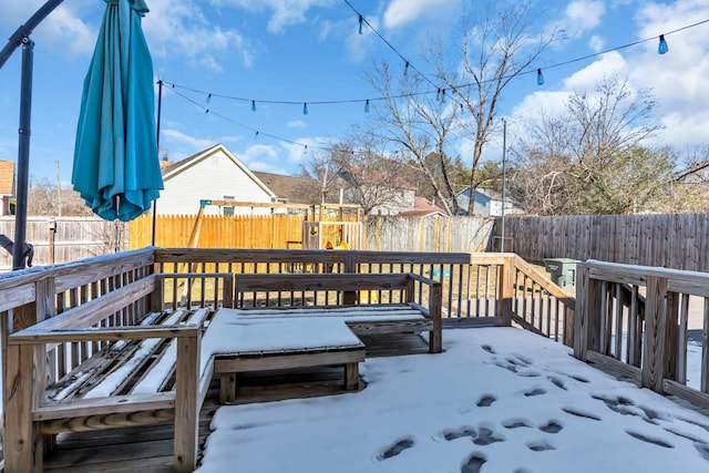 view of snow covered deck