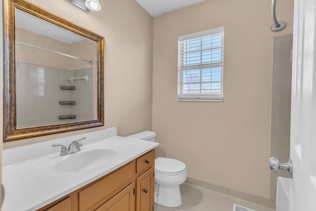 bathroom with toilet and vanity