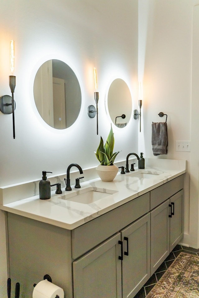 bathroom with vanity and tile patterned floors