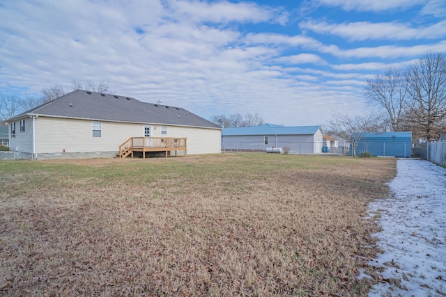 view of yard with a wooden deck