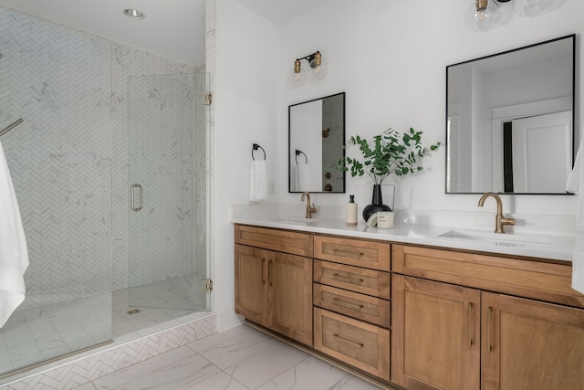 bathroom featuring an enclosed shower and vanity