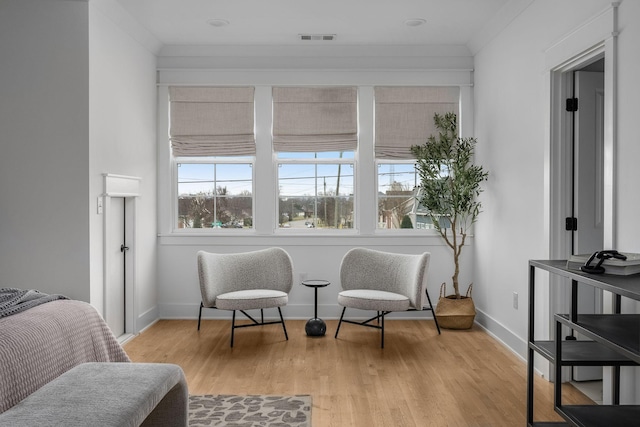 living area featuring light hardwood / wood-style floors