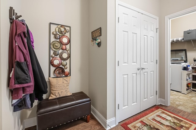 hall with hardwood / wood-style floors