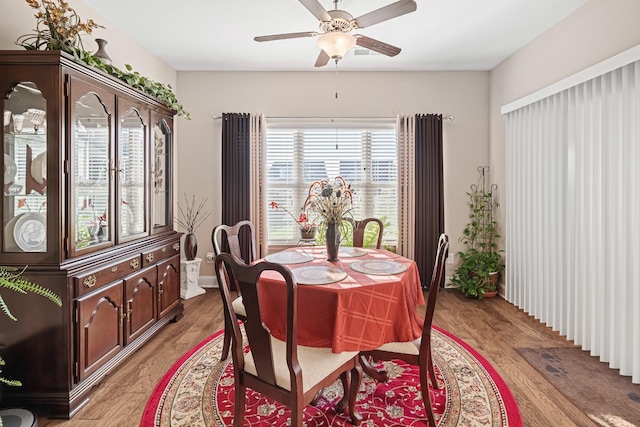 dining area featuring ceiling fan and light hardwood / wood-style floors