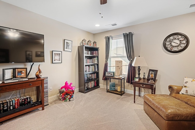 sitting room with light carpet