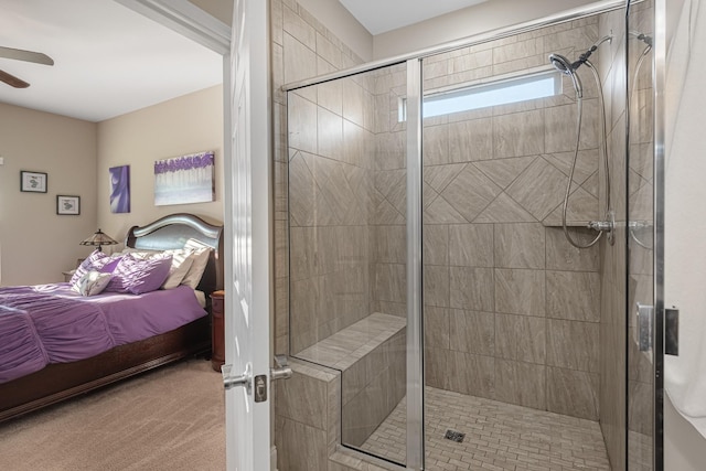 bathroom featuring a shower with shower door