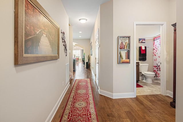 hall featuring dark hardwood / wood-style floors