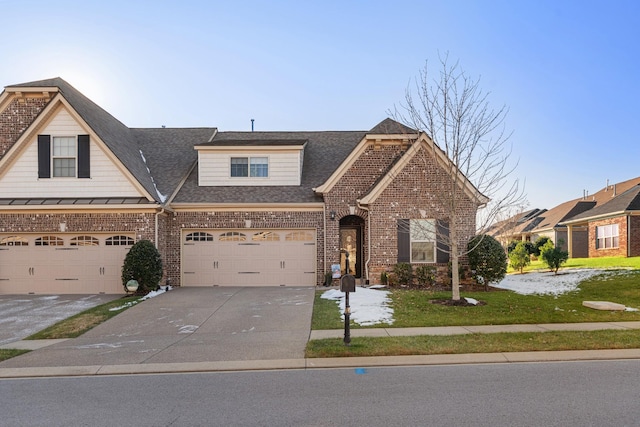 view of front facade featuring a front yard and a garage