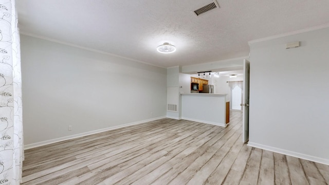 unfurnished living room featuring a textured ceiling, light wood-type flooring, and crown molding