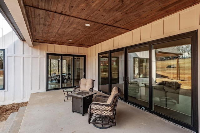 view of patio featuring an outdoor fire pit