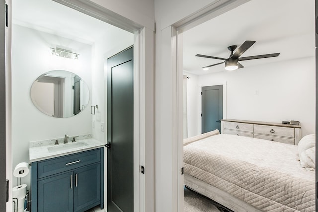 bedroom featuring sink and ceiling fan