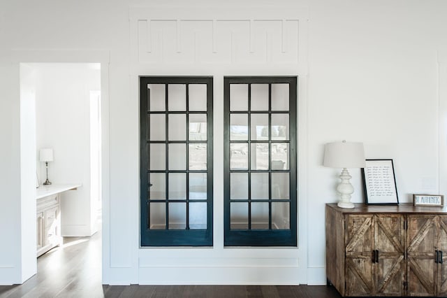 doorway to outside featuring wood-type flooring