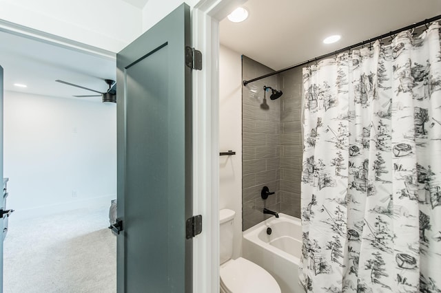 bathroom featuring shower / bath combination with curtain and toilet