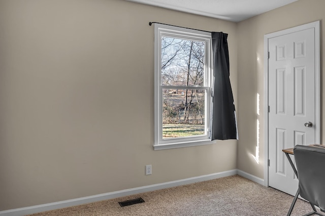 unfurnished office with light carpet