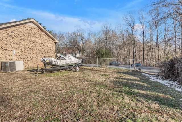 view of yard featuring central AC unit