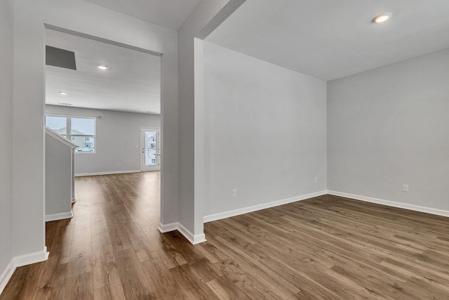 empty room featuring hardwood / wood-style flooring