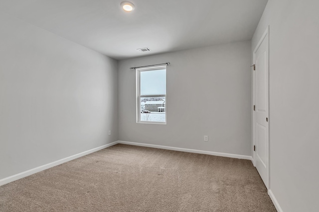 unfurnished room with carpet