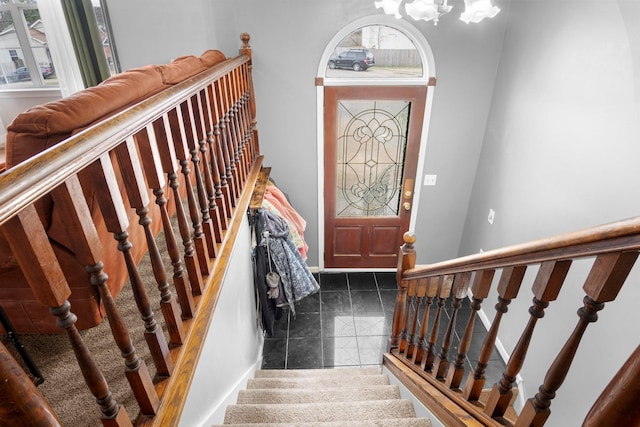 entryway with an inviting chandelier