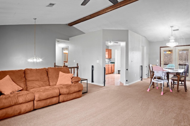 living room featuring ceiling fan with notable chandelier, light carpet, and vaulted ceiling with beams