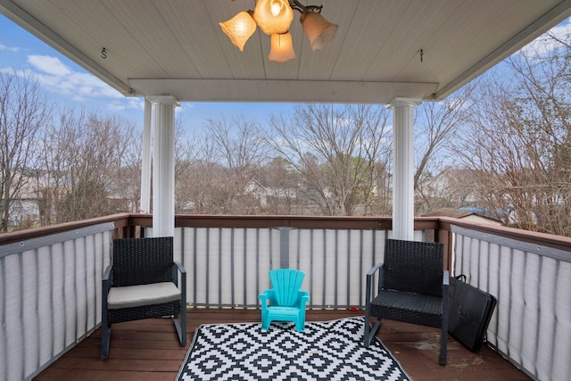 wooden terrace with ceiling fan