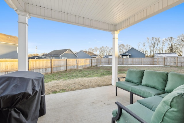 view of patio with grilling area and outdoor lounge area