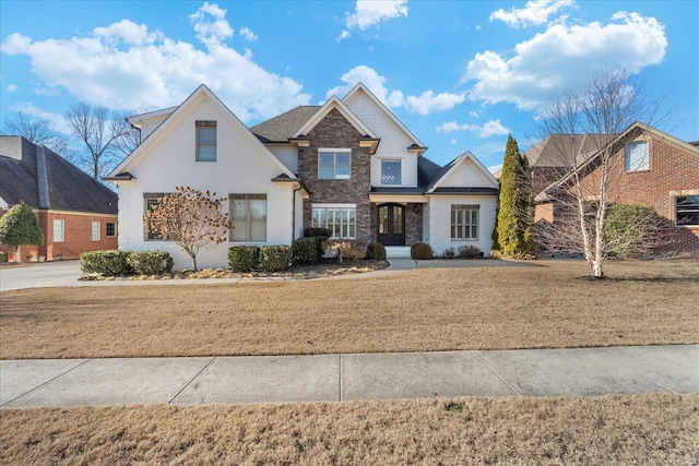 view of front of home with a front lawn