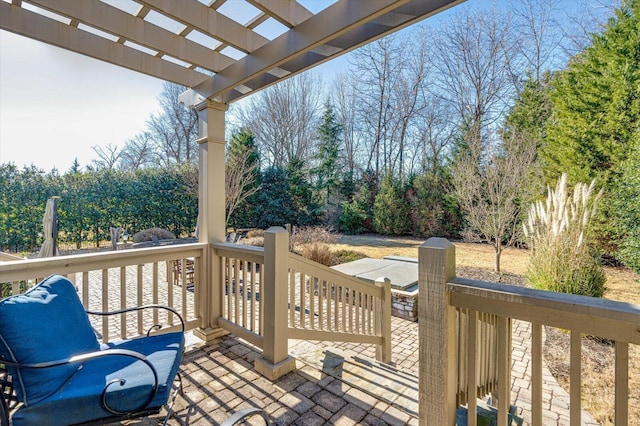 wooden deck with a patio area