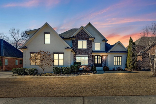 view of front of house with a lawn