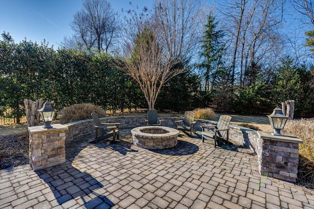 view of patio / terrace featuring a fire pit