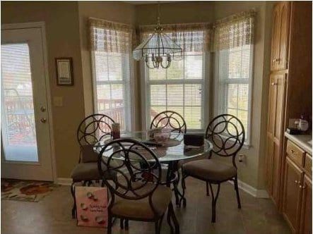 dining area with a chandelier