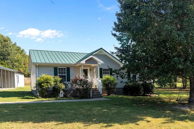 view of front of house with a front lawn