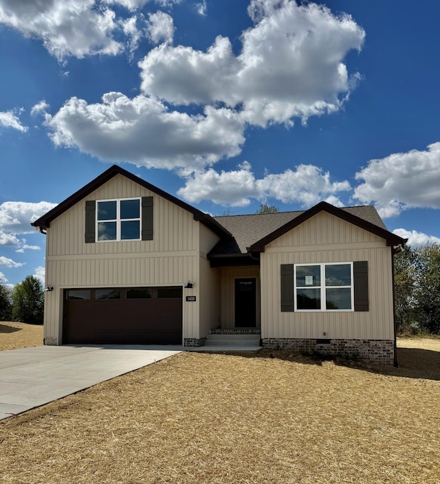 view of front of property with a garage