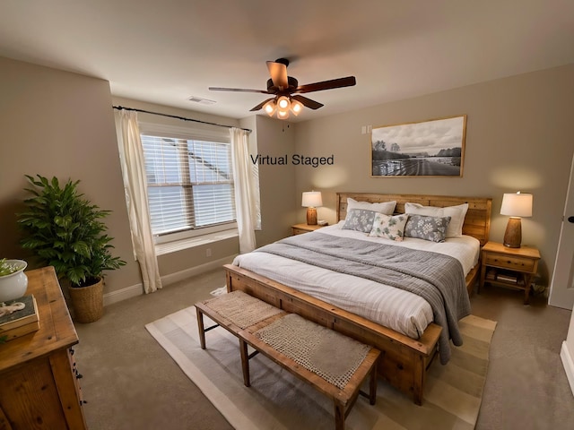 carpeted bedroom featuring ceiling fan