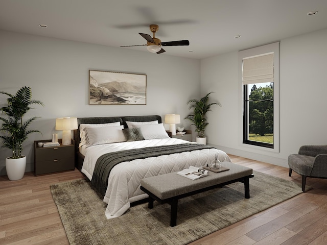 bedroom featuring ceiling fan and light wood-type flooring