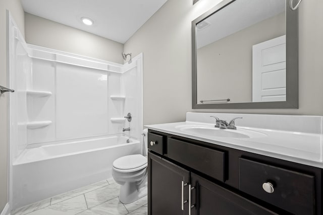 full bathroom featuring vanity, washtub / shower combination, and toilet