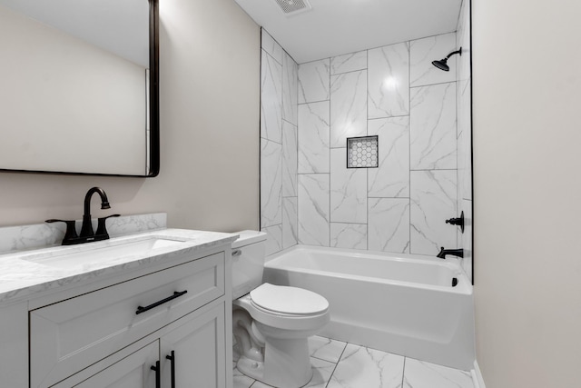 full bathroom featuring toilet, tiled shower / bath combo, and vanity