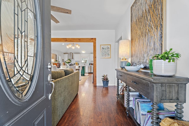 foyer featuring dark wood-type flooring