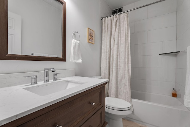 full bathroom featuring toilet, vanity, and shower / bath combo