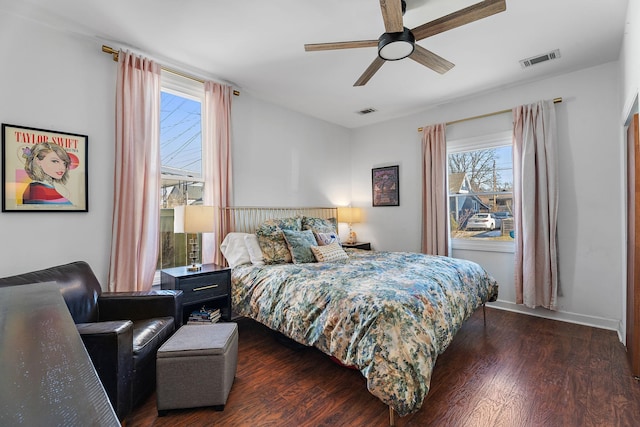 bedroom featuring dark wood-type flooring and ceiling fan