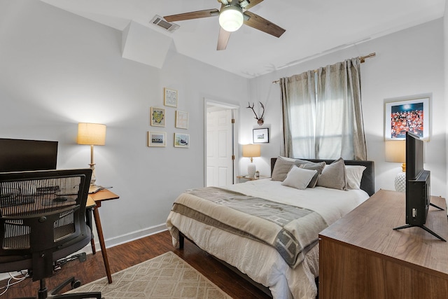 bedroom featuring ceiling fan and dark hardwood / wood-style flooring