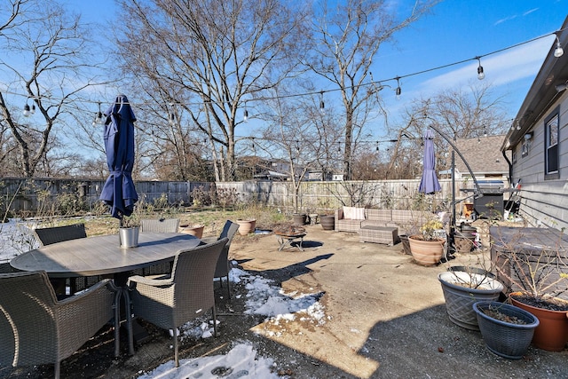 view of patio featuring a grill