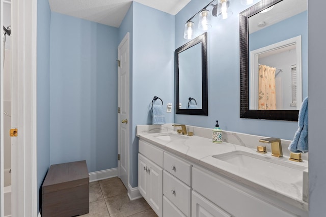 bathroom featuring vanity and tile patterned floors