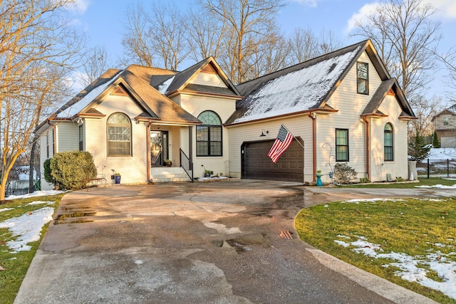 view of front of home with a garage