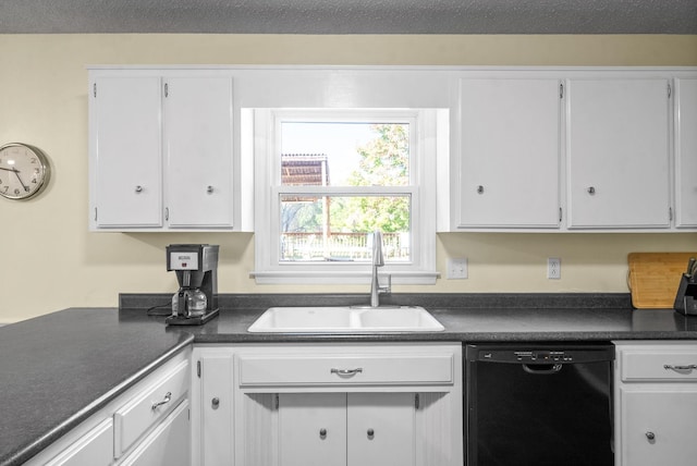 kitchen featuring white cabinets, black dishwasher, and sink