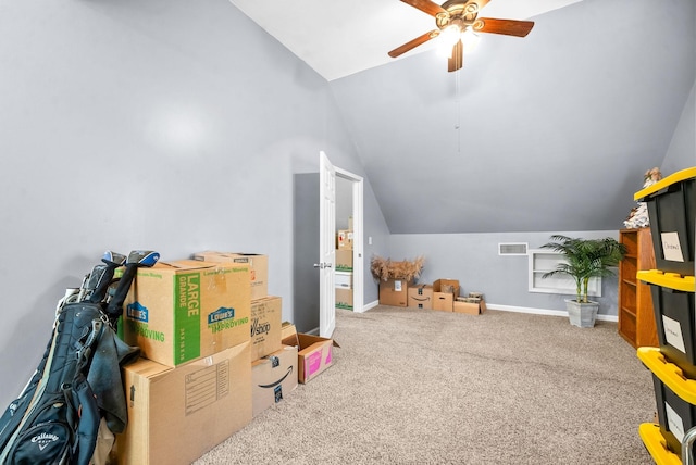 playroom featuring lofted ceiling, carpet flooring, and ceiling fan