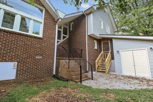 rear view of house with a patio