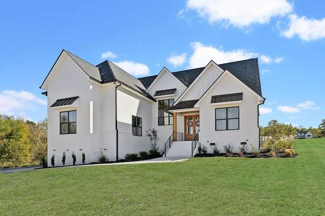 modern farmhouse featuring a front lawn